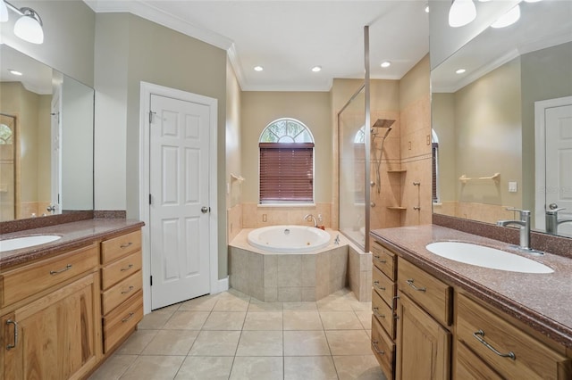 1811 Irving Ave, Lehigh Acres, FL 33972 - full bathroom featuring ornamental molding, a garden tub, two vanities, a shower stall, and tile patterned floors