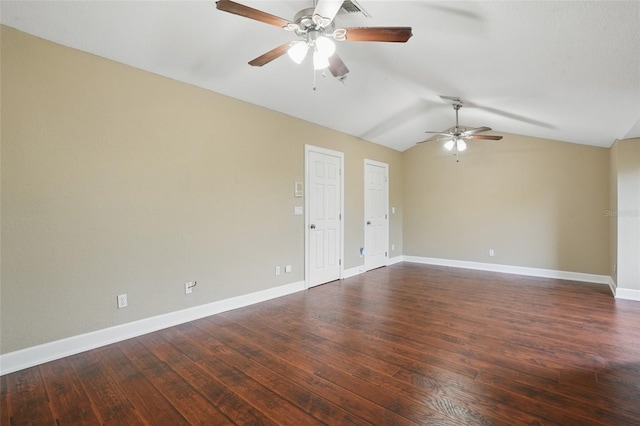1811 Irving Ave, Lehigh Acres, FL 33972 - empty room featuring ceiling fan, vaulted ceiling, dark wood finished floors, and baseboards