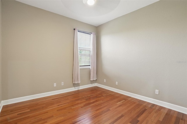 1811 Irving Ave, Lehigh Acres, FL 33972 - empty room with ceiling fan, light wood-type flooring, and baseboards