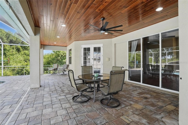 1811 Irving Ave, Lehigh Acres, FL 33972 - view of patio / terrace with outdoor dining area, ceiling fan, and french doors