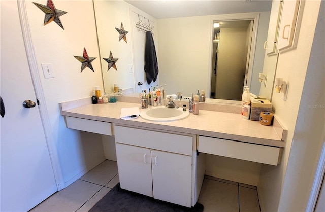 bathroom featuring tile patterned floors and vanity