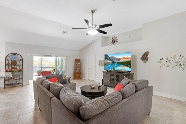 27147 Guapore Dr, Punta Gorda, FL 33983 - living area featuring a ceiling fan, baseboards, high vaulted ceiling, and light tile patterned flooring