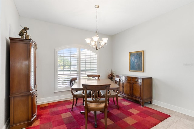 27147 Guapore Dr, Punta Gorda, FL 33983 - dining room featuring baseboards and a notable chandelier
