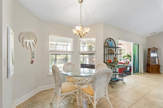 27147 Guapore Dr, Punta Gorda, FL 33983 - dining room featuring baseboards, visible vents, light tile patterned floors, and an inviting chandelier