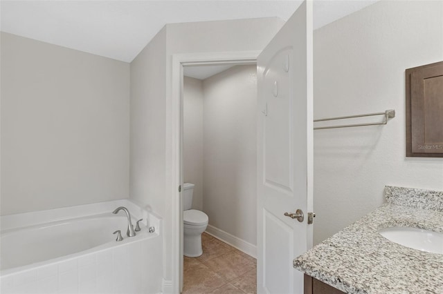 27147 Guapore Dr, Punta Gorda, FL 33983 - full bath with vanity, toilet, tile patterned flooring, and a garden tub