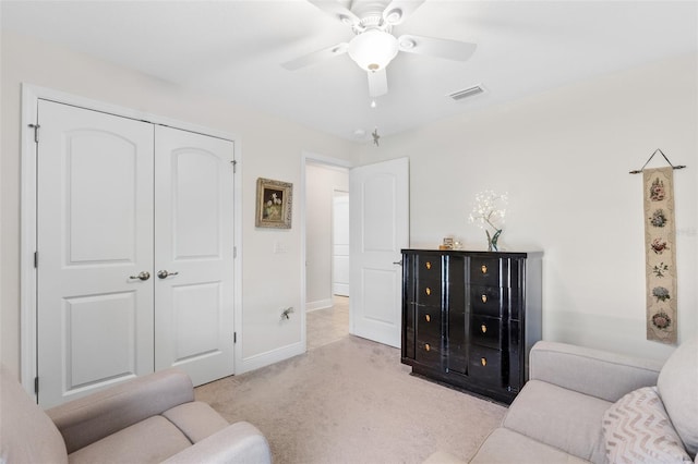27147 Guapore Dr, Punta Gorda, FL 33983 - living room with carpet floors, visible vents, a ceiling fan, and baseboards
