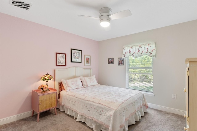 27147 Guapore Dr, Punta Gorda, FL 33983 - bedroom with baseboards, visible vents, a ceiling fan, and light colored carpet