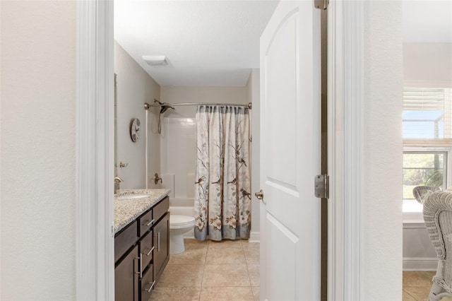 27147 Guapore Dr, Punta Gorda, FL 33983 - bathroom featuring shower / bath combination with curtain, tile patterned flooring, vanity, and toilet