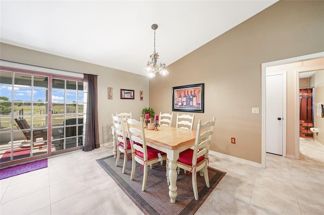 dining space featuring high vaulted ceiling, baseboards, a notable chandelier, and light tile patterned flooring