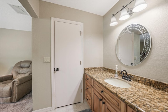 bathroom featuring visible vents and vanity