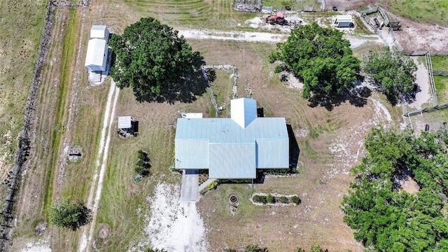 birds eye view of property featuring a rural view
