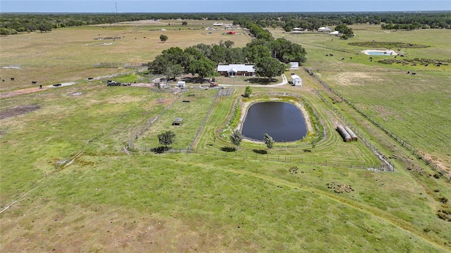 birds eye view of property featuring a rural view and a water view