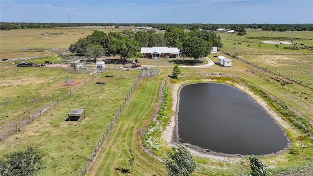 bird's eye view with a water view and a rural view