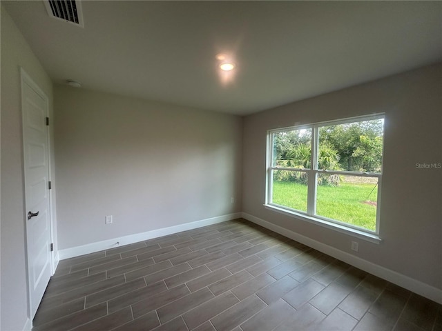 23245 Jules Ave, Port Charlotte, FL 33980 - spare room with recessed lighting and a smoke detector