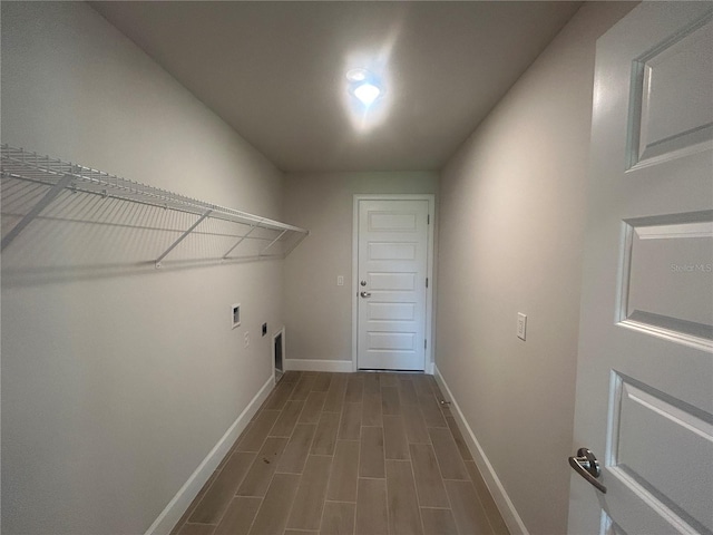 23245 Jules Ave, Port Charlotte, FL 33980 - laundry room with hookup for an electric dryer, dark wood-style flooring, and gas dryer hookup