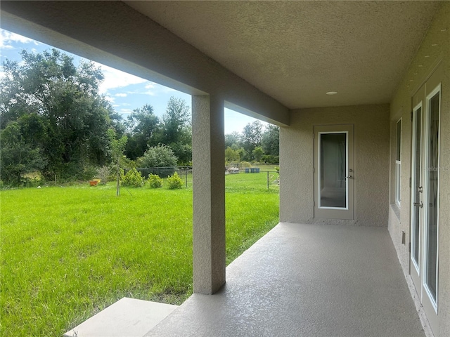 23245 Jules Ave, Port Charlotte, FL 33980 - view of patio / terrace featuring view of wooded area