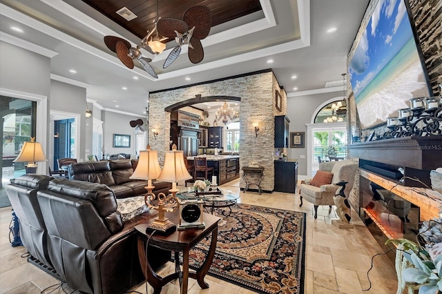 3866 Turtle Dove Blvd, Punta Gorda, FL 33950 - living room with a raised ceiling, arched walkways, decorative columns, recessed lighting, and a ceiling fan