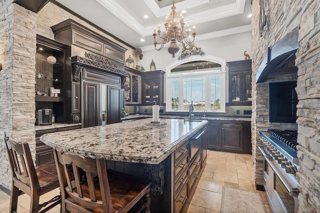 3866 Turtle Dove Blvd, Punta Gorda, FL 33950 - kitchen featuring light stone counters, crown molding, stone tile floors, a high ceiling, and open shelves
