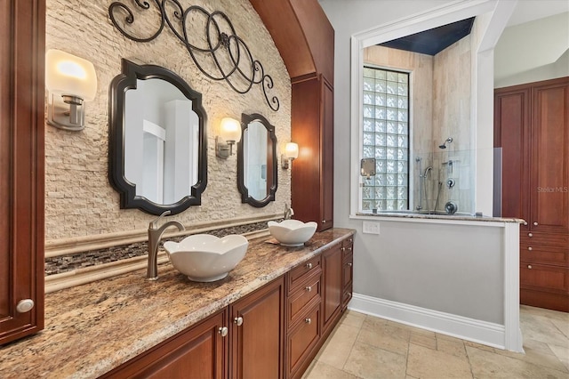 3866 Turtle Dove Blvd, Punta Gorda, FL 33950 - bathroom with walk in shower, double vanity, baseboards, and healthy amount of natural light