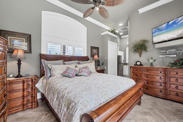3866 Turtle Dove Blvd, Punta Gorda, FL 33950 - bedroom with freestanding refrigerator, ornamental molding, a ceiling fan, and a closet