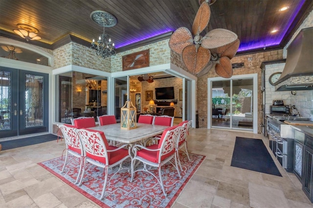 3866 Turtle Dove Blvd, Punta Gorda, FL 33950 - view of patio / terrace with french doors, area for grilling, a ceiling fan, and outdoor dining space