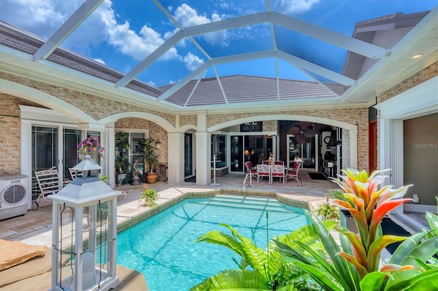 3866 Turtle Dove Blvd, Punta Gorda, FL 33950 - swimming pool with a patio area, a cooling unit, and glass enclosure