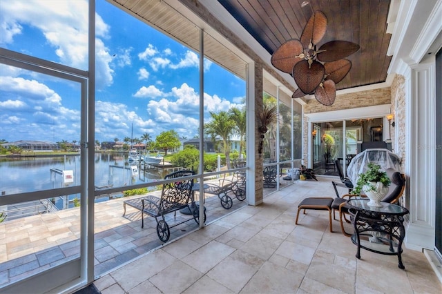 3866 Turtle Dove Blvd, Punta Gorda, FL 33950 - sunroom / solarium featuring a ceiling fan and a water view