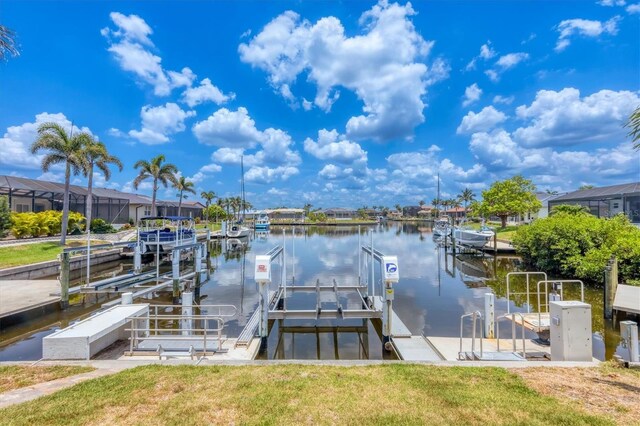 3866 Turtle Dove Blvd, Punta Gorda, FL 33950 - dock with boat lift, a water view, and a residential view
