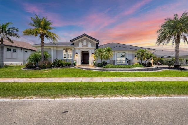 3866 Turtle Dove Blvd, Punta Gorda, FL 33950 - view of front of house featuring stucco siding and a yard