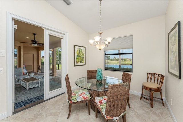 4015 La Costa Island Ct, Punta Gorda, FL 33950 - dining room featuring healthy amount of natural light, lofted ceiling, a chandelier, and baseboards