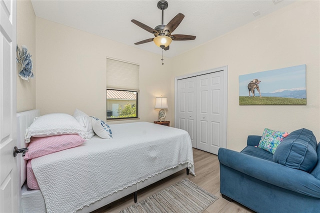 4015 La Costa Island Ct, Punta Gorda, FL 33950 - bedroom featuring wood finished floors, a closet, and ceiling fan