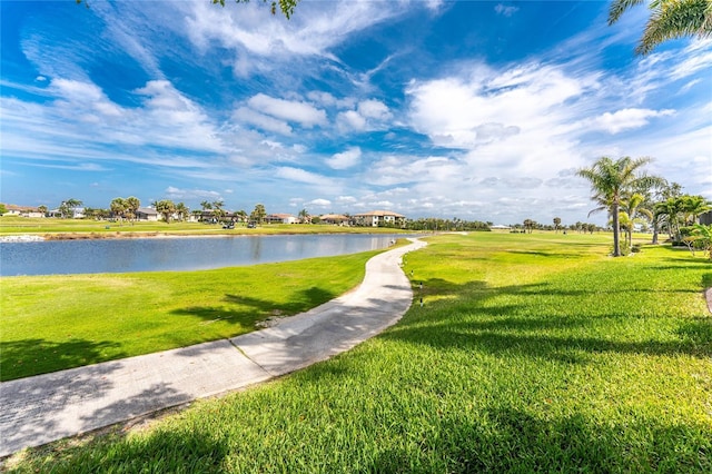 4015 La Costa Island Ct, Punta Gorda, FL 33950 - view of community featuring a water view and a lawn