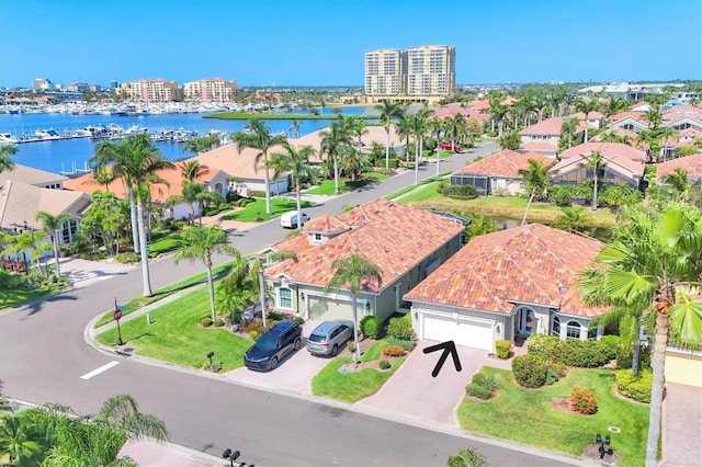 303 11th Ave E, Palmetto, FL 34221 - aerial view of property and surrounding area with a nearby body of water