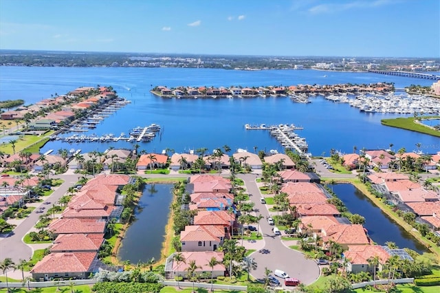 303 11th Ave E, Palmetto, FL 34221 - aerial view of residential area featuring a large body of water and numerous boat docks
