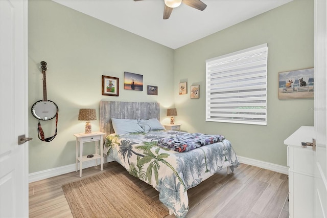 303 11th Ave E, Palmetto, FL 34221 - bedroom featuring wood finished floors, baseboards, and ceiling fan