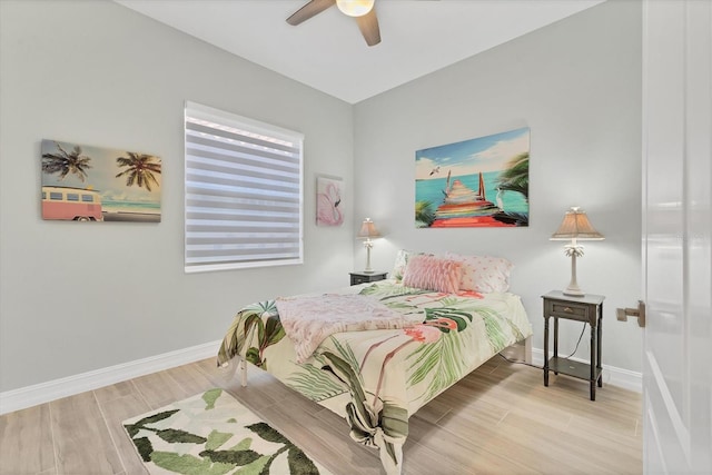 303 11th Ave E, Palmetto, FL 34221 - bedroom featuring baseboards, wood finished floors, and ceiling fan
