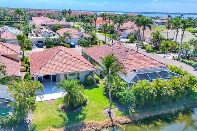 303 11th Ave E, Palmetto, FL 34221 - aerial view of residential area featuring a nearby body of water