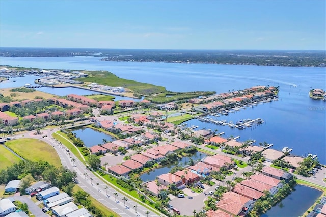 303 11th Ave E, Palmetto, FL 34221 - aerial view of property and surrounding area featuring a nearby body of water and nearby suburban area
