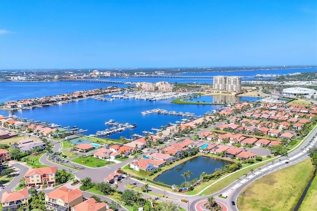 303 11th Ave E, Palmetto, FL 34221 - aerial view of residential area with a large body of water and a marina