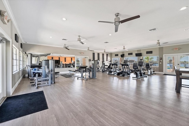 303 11th Ave E, Palmetto, FL 34221 - workout area featuring a ceiling fan, ornamental molding, healthy amount of natural light, recessed lighting, and light wood finished floors