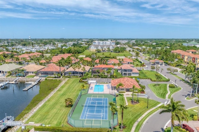 303 11th Ave E, Palmetto, FL 34221 - aerial perspective of suburban area with a nearby body of water