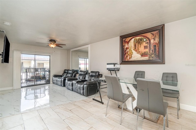 4516 Santa Barbara Blvd Unit 1, Cape Coral, FL 33914 - living room with marble finish floor, a ceiling fan, and baseboards