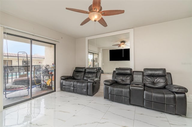 4516 Santa Barbara Blvd Unit 1, Cape Coral, FL 33914 - living room featuring a ceiling fan and marble finish floor
