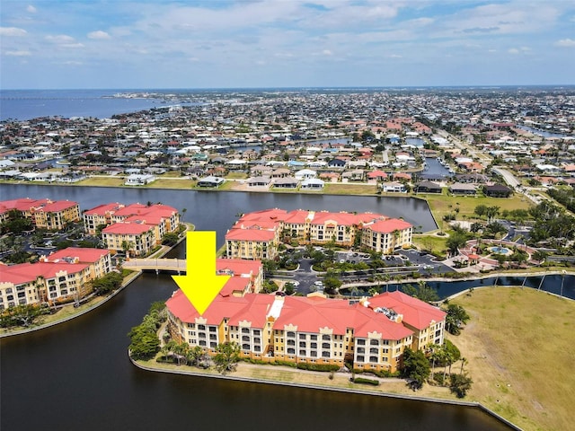drone / aerial view with a water view