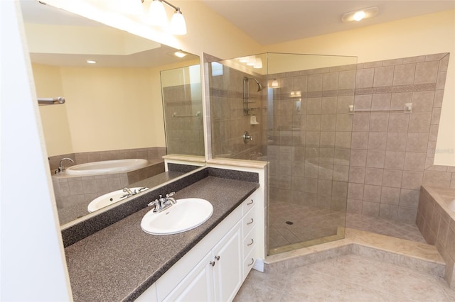 bathroom featuring recessed lighting, a bath, a tile shower, tile patterned flooring, and vanity