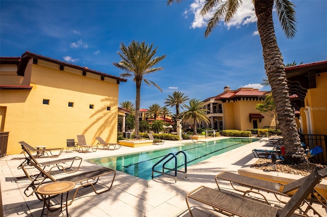 pool with a patio area