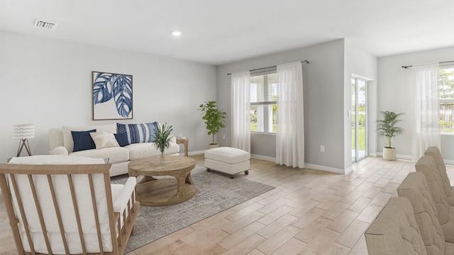 4960 Tuscola Blvd, North Port, FL 34287 - living area with light wood finished floors and recessed lighting
