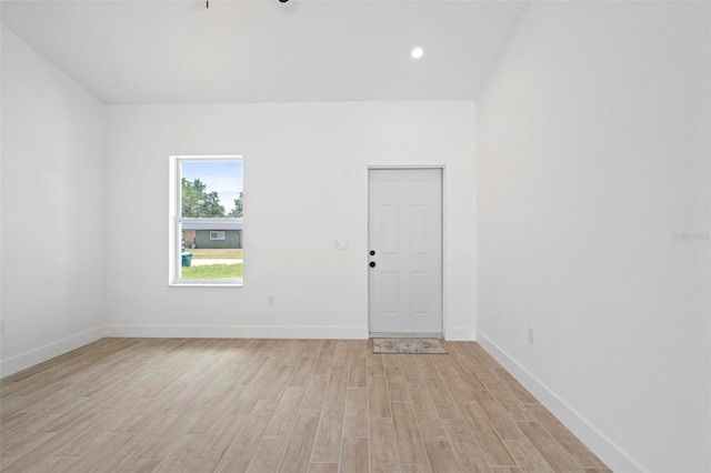 21480 Eldred Ave, Port Charlotte, FL 33952 - spare room featuring light wood-style flooring, baseboards, and recessed lighting
