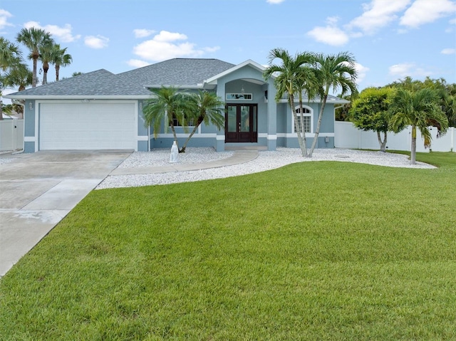 18652 Ohara Dr, Port Charlotte, FL 33948 - ranch-style home featuring french doors, a front lawn, fence, a garage, and stucco siding