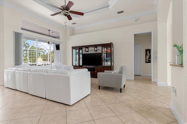 18652 Ohara Dr, Port Charlotte, FL 33948 - living area featuring light tile patterned flooring, baseboards, visible vents, ceiling fan, and ornamental molding